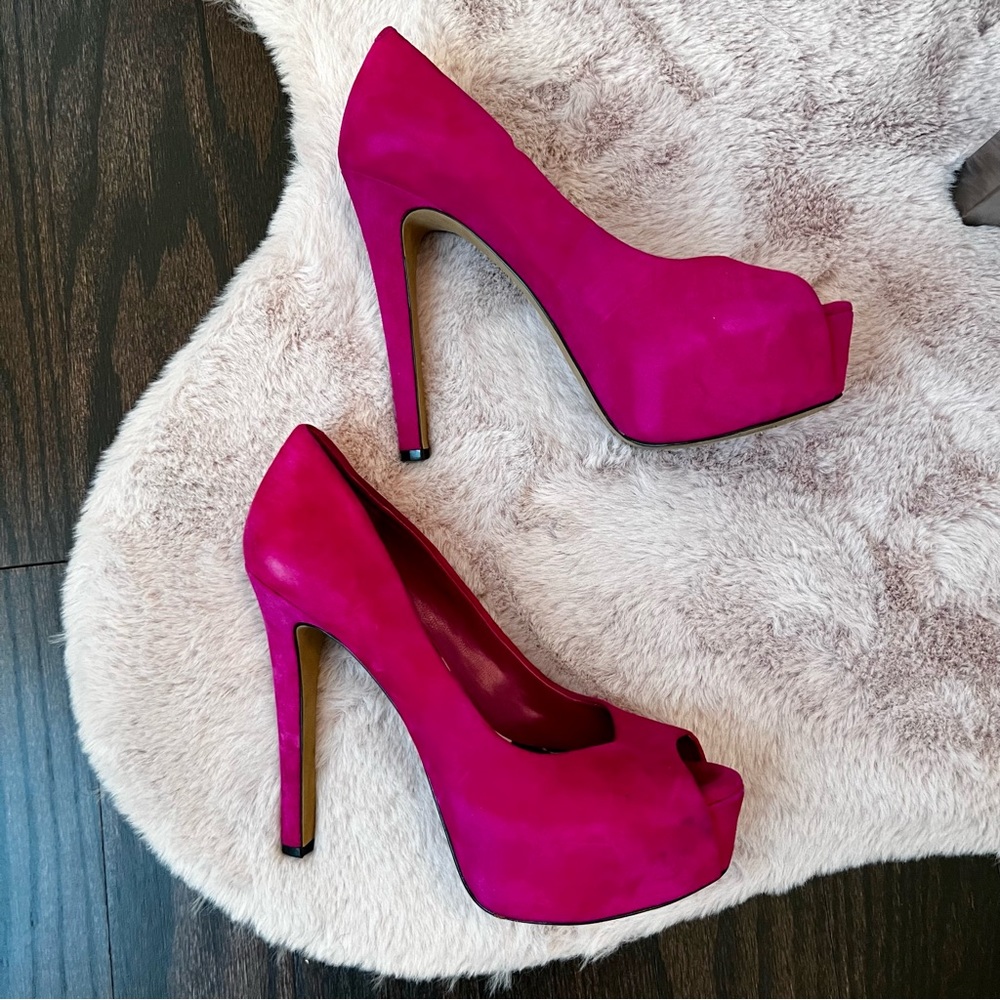 Jessica Simpson pink platform peep toe shoes.